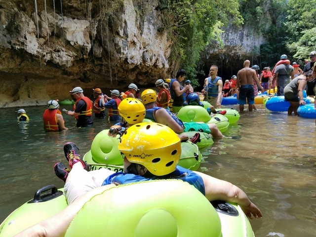 Belize Crystal Cave Exploration and River Tubing Excursion River Runs through Antiquity...