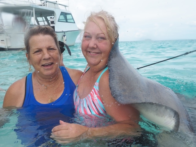 Grand Cayman Stingray City, Coral Gardens, and Starfish Snorkel Super Combo Excursion stingray city and Grand Cayman Islands was absolutely amazing