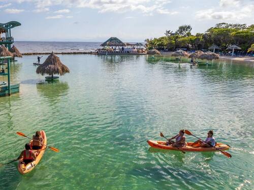 Roatan Sloth Farm and Little French Key Island Beach Excursion with Round-Trip Transport